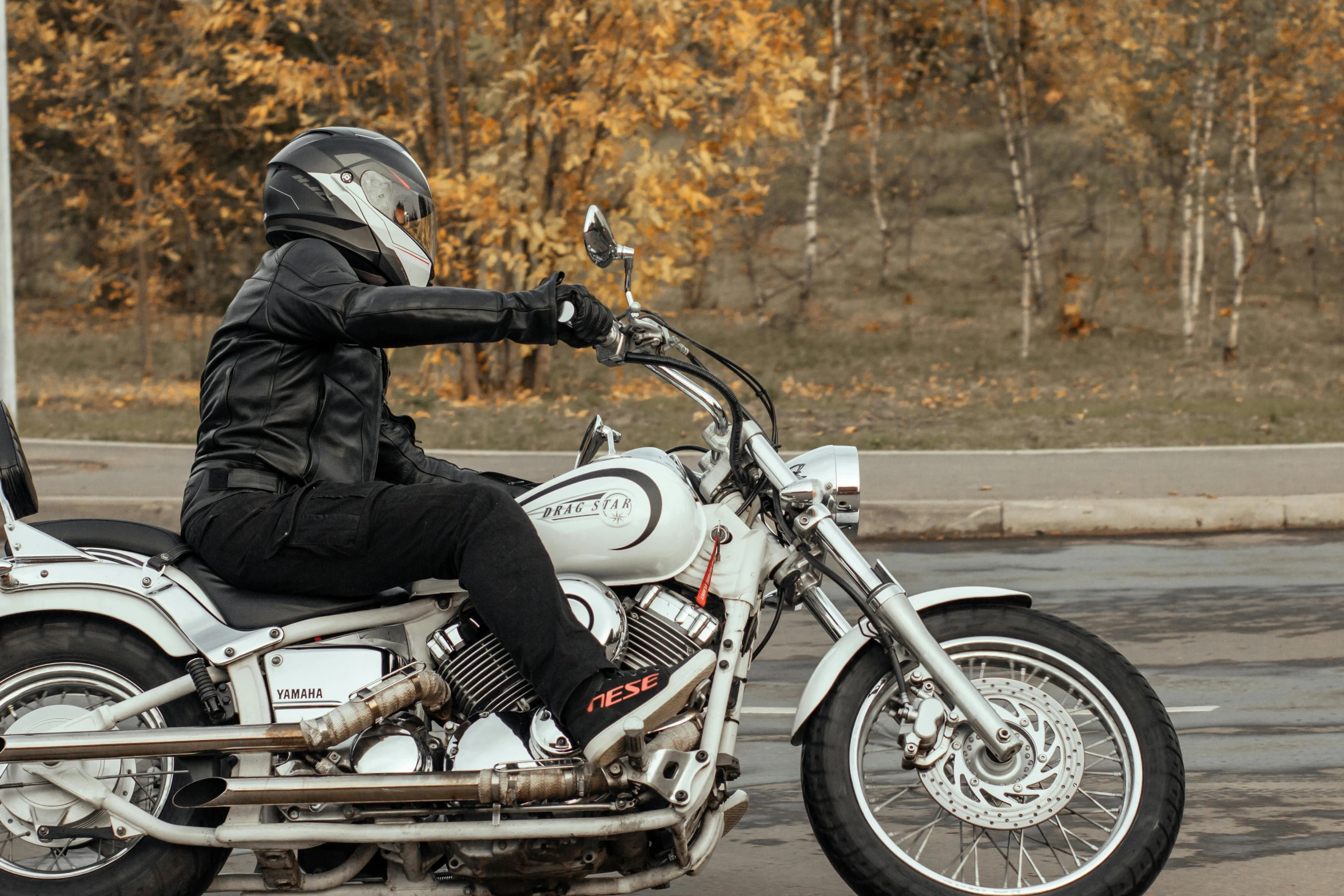 a person wearing a helmet on a motorcycle