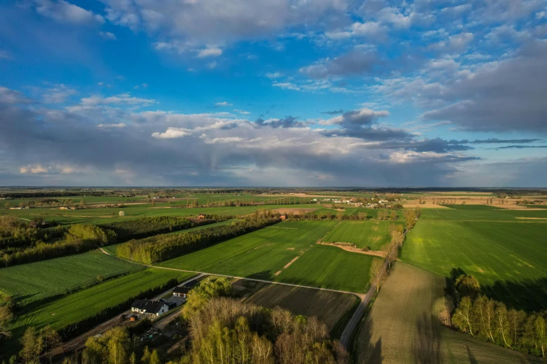 an aerial s of a green countryside