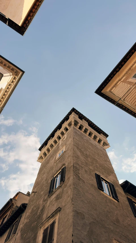 two buildings are standing next to each other