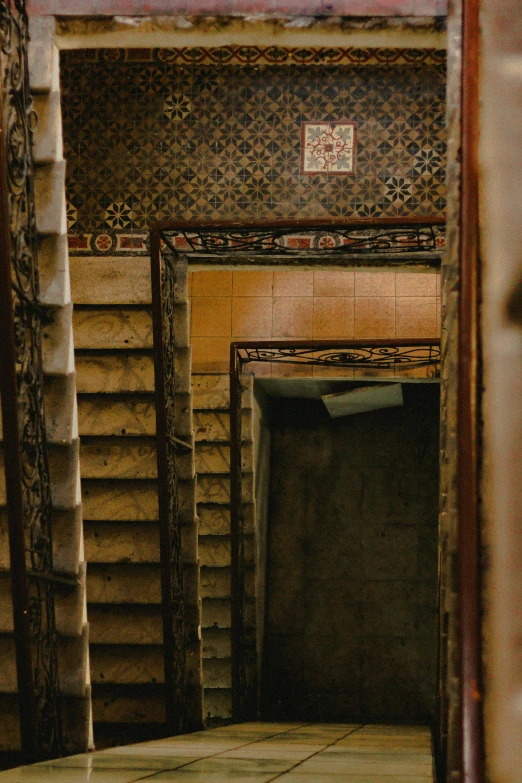 an old building with a door and a tiled floor