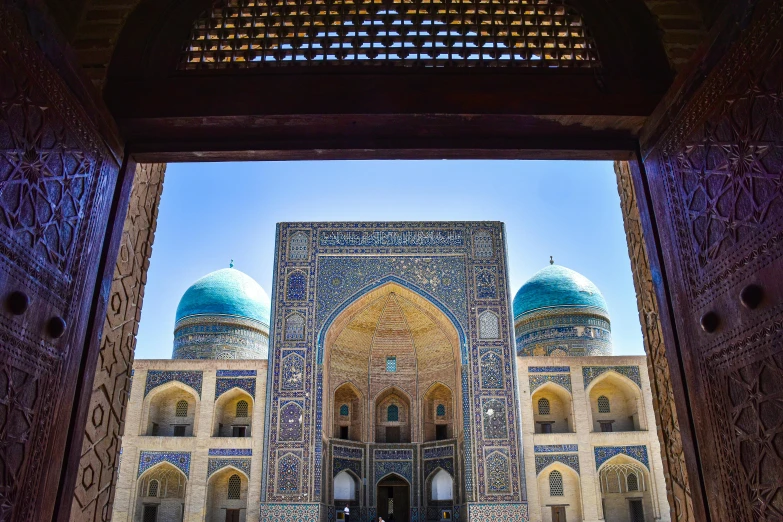 blue domed building with many windows and pillars