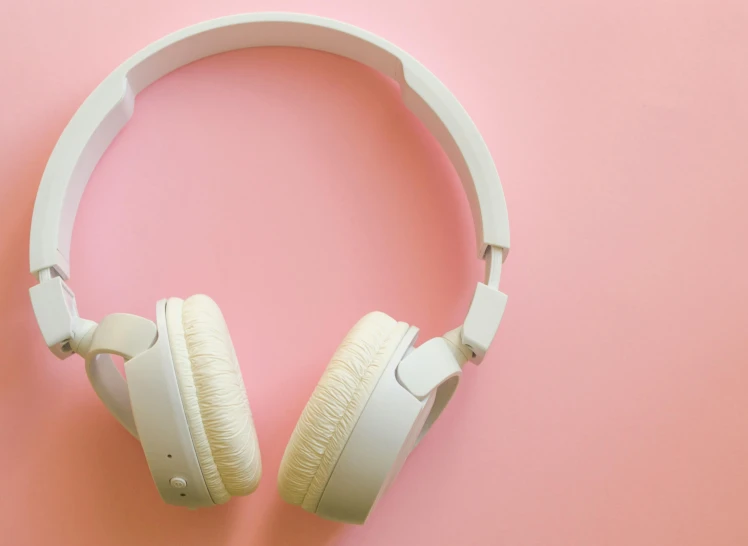 there is a pair of headphones laying on the table