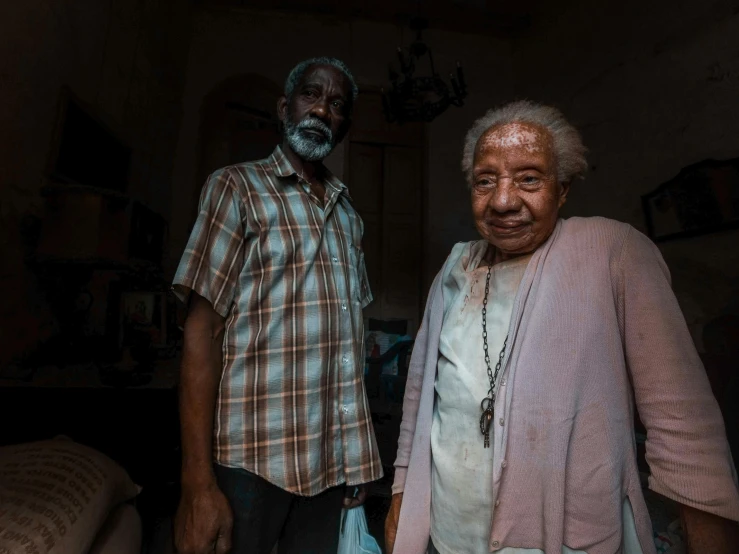 two older men standing next to each other