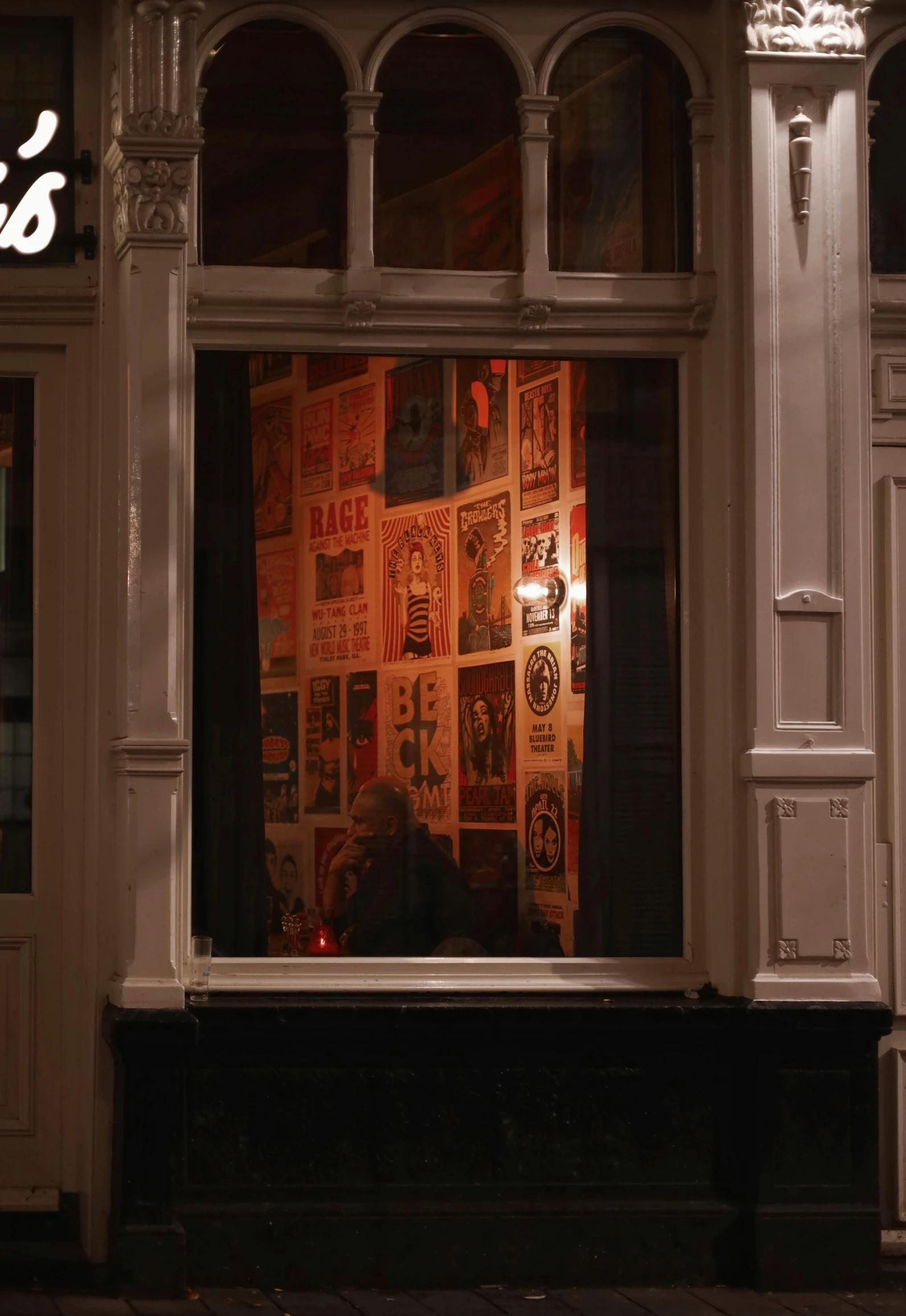 the front window of a store displaying newspaper s