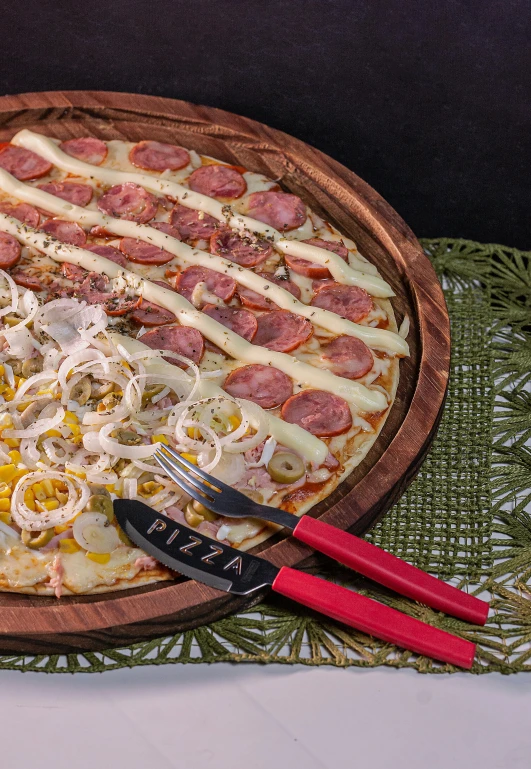 there is a pizza in the pan on the table