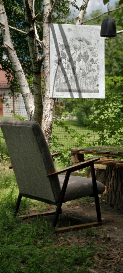 an old lawn chair is in front of a tree