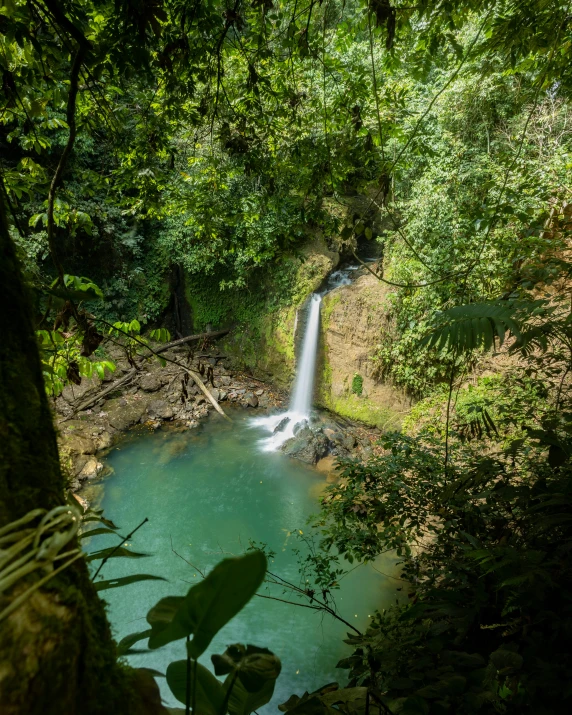 a view of a small waterfall from the side