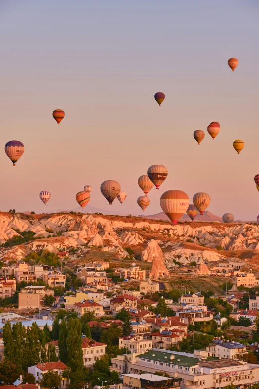 many  air balloons flying in the sky