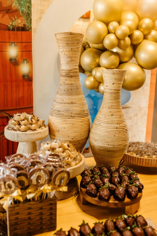 dessert tables lined up with chocolate covered desserts