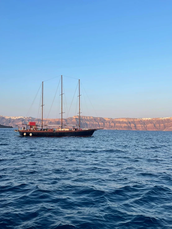 a boat that is floating on some water