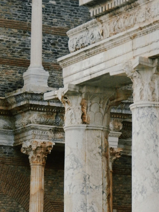 pillars stand in front of an old building