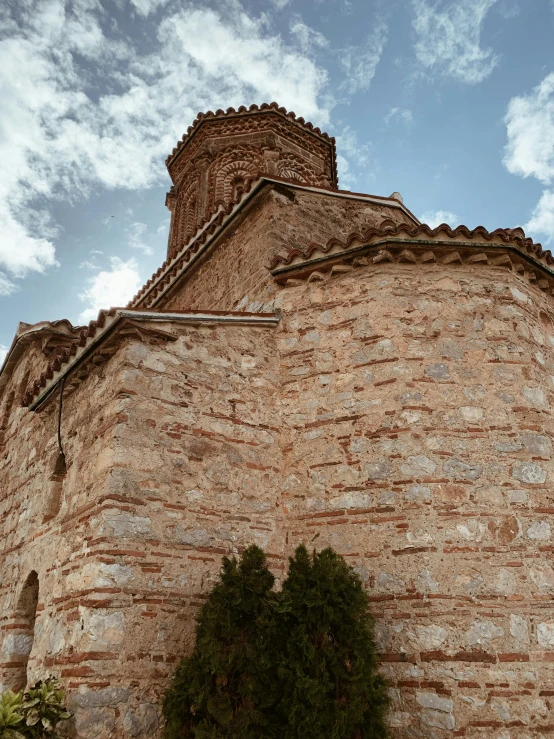 a castle wall and building on top of it