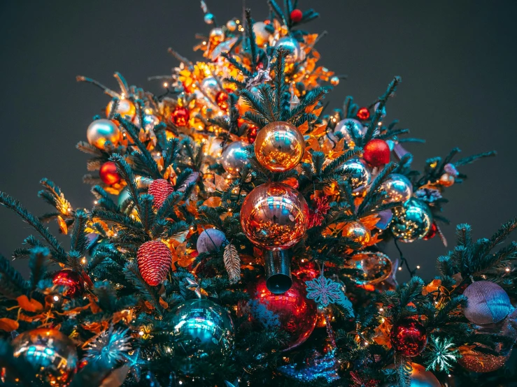 a decorated christmas tree with ornaments in it