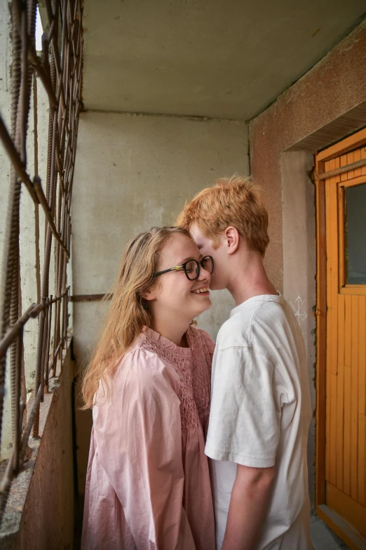 the young couple are having fun together in their house