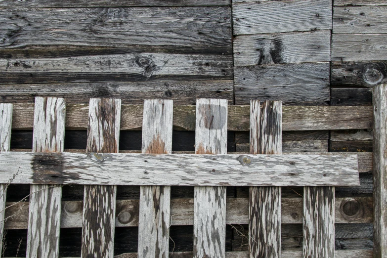 some old boards with peeling paint on them