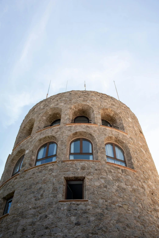 a building that is standing on the side of a hill