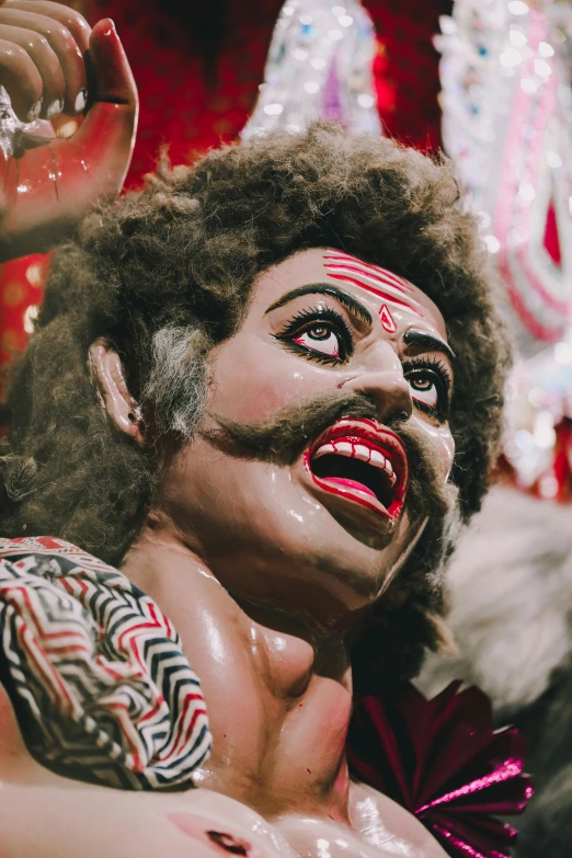 a man with  on his face painted black and white