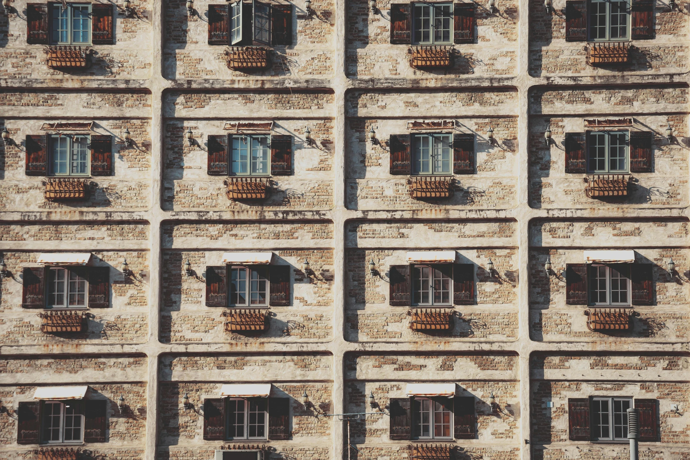 a building that is made up of six balconies