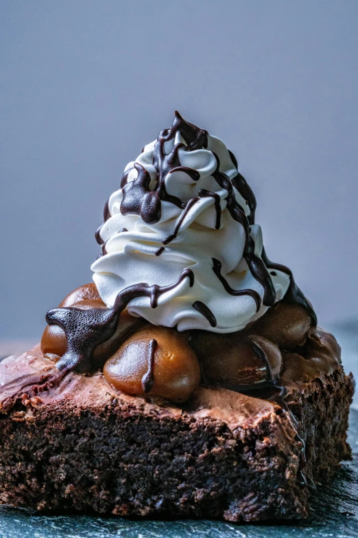 chocolate dessert with whipped cream and chocolate shavings