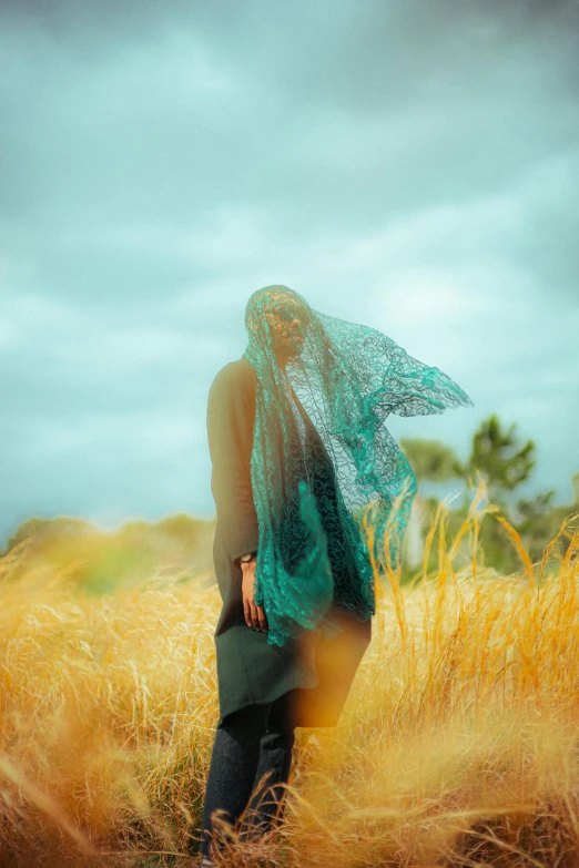 the woman in the blue dress stands alone