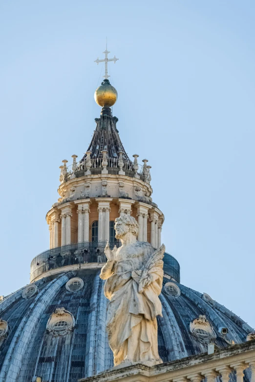 the top view of a building with statues on top of it