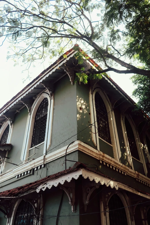 a view of a building on the corner of a street