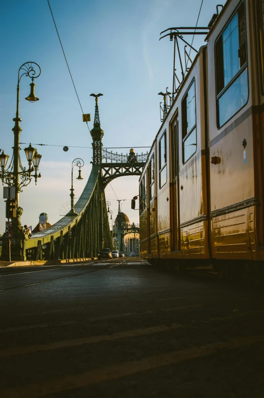 a street scene with focus on a street and a train