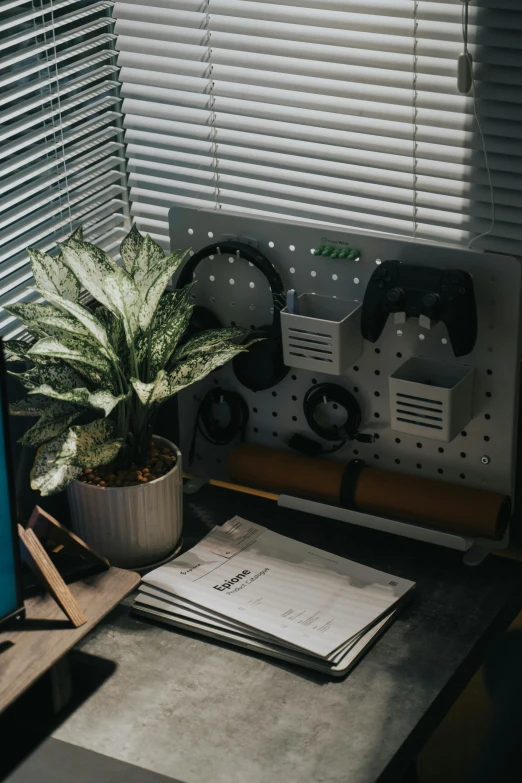 an office desk with some papers and a computer monitor