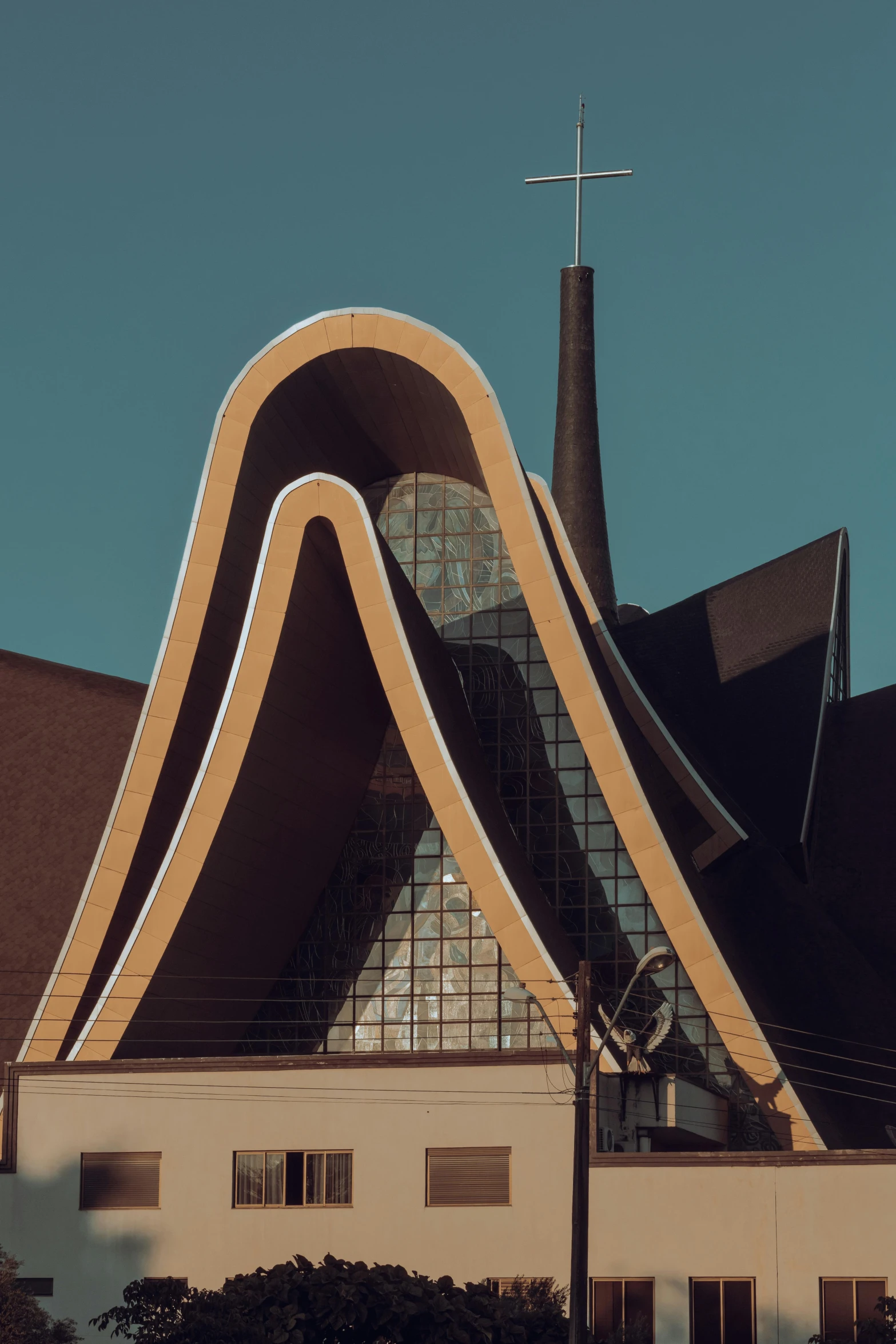 a very fancy church with the cross on top