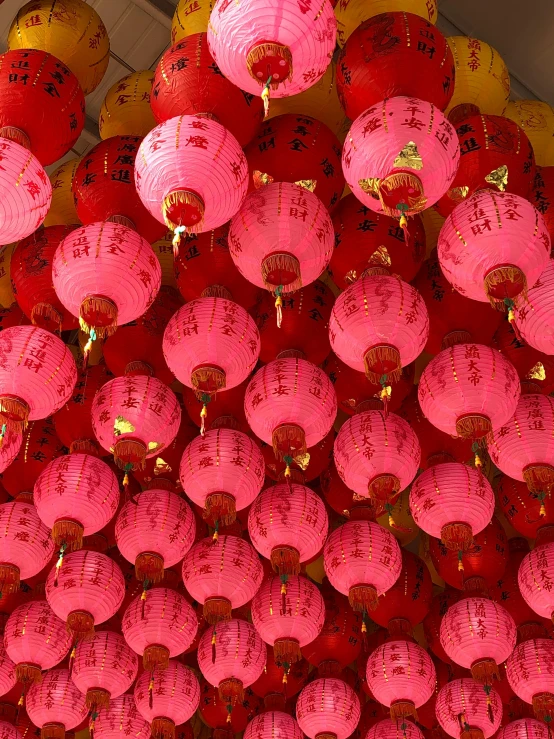 a group of paper lanterns in an oriental shop
