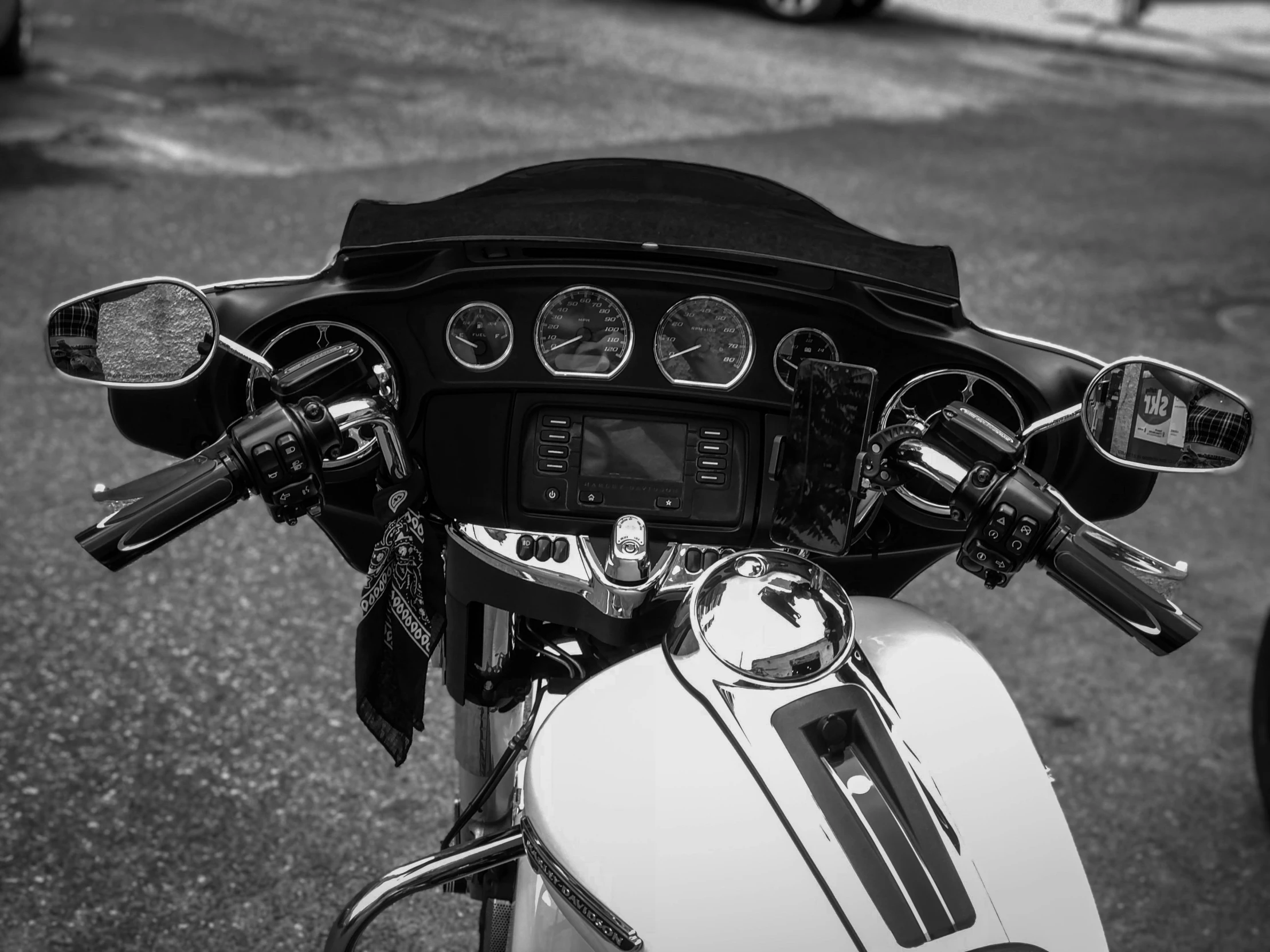 this motorcycle has a dash light, tachometer, and other instrument controls