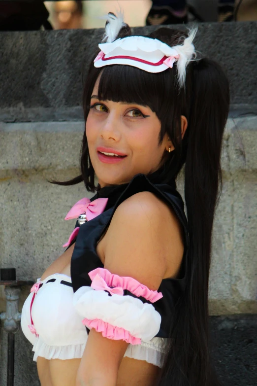 a  dressed in cosplay posing for the camera