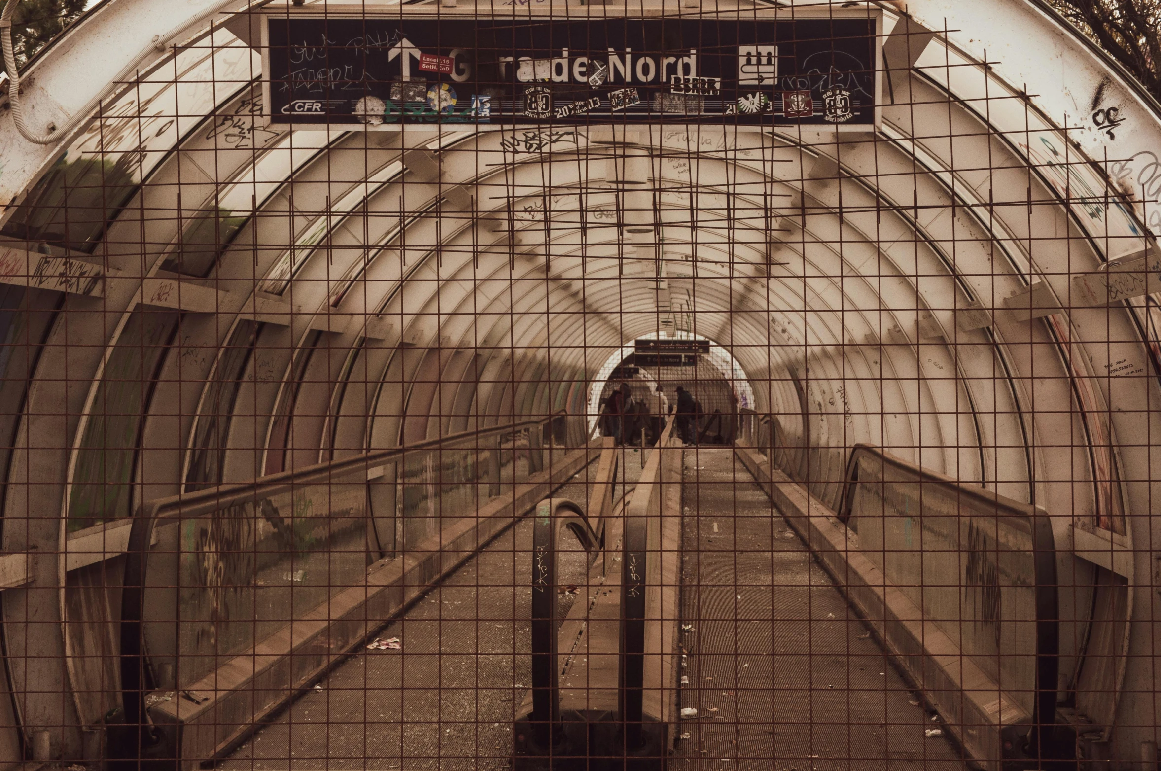 a long train going through a subway tunnel