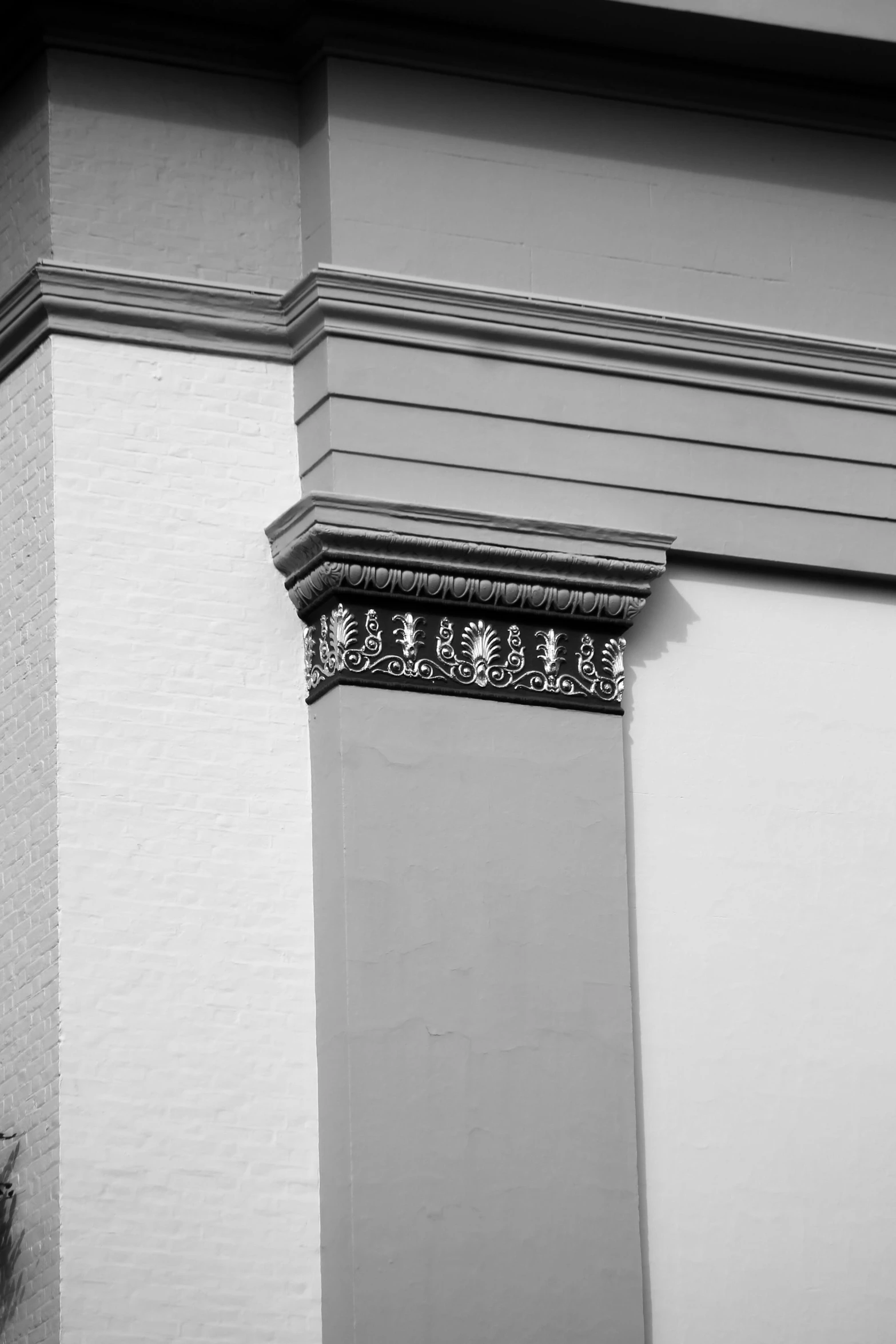 an architectural column on the side of a building