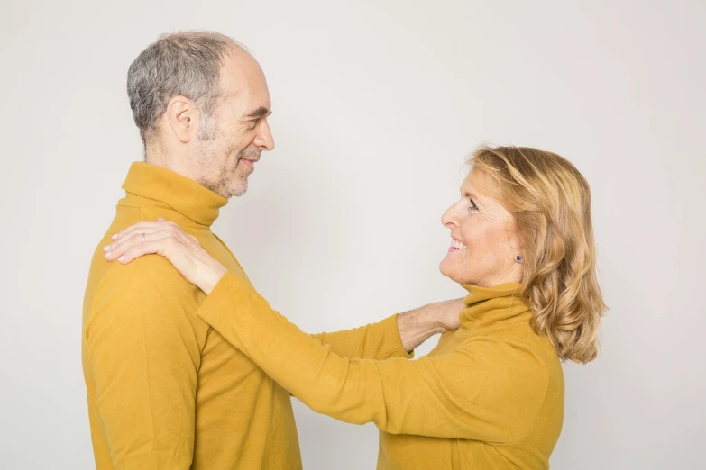 an older couple is posing for their po