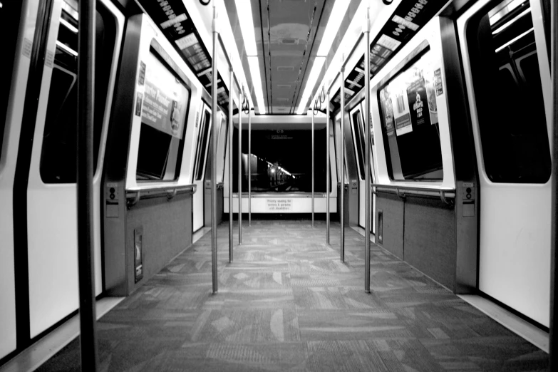 a subway has a line of doors and windows