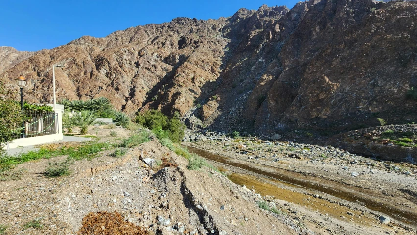 a road that has some water coming out of it