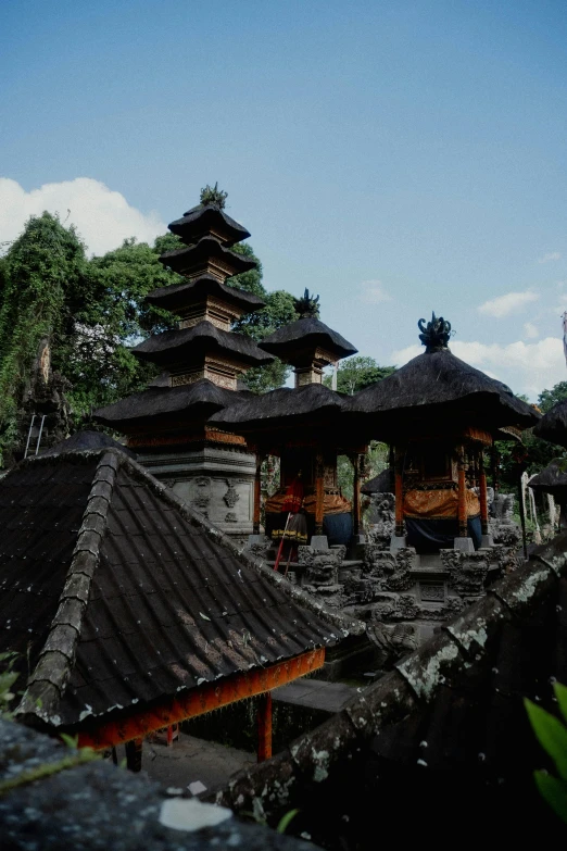 an ancient pagoda is surrounded by stone