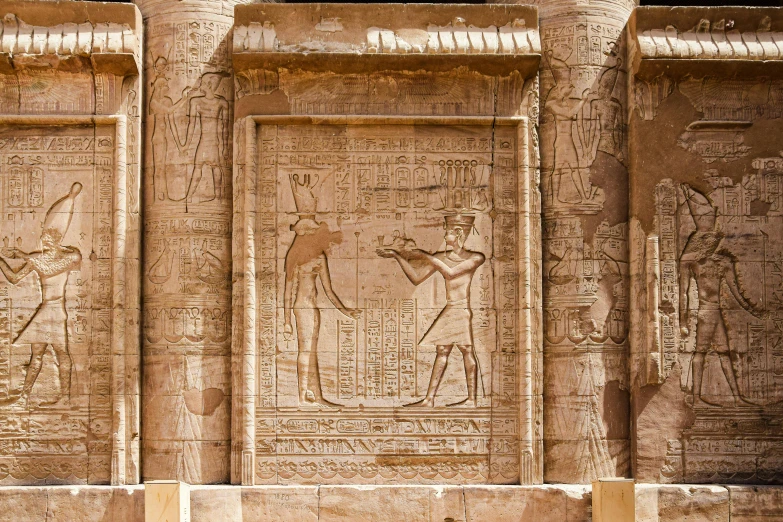 two relief depicting ancient egypt's gods and goddesses