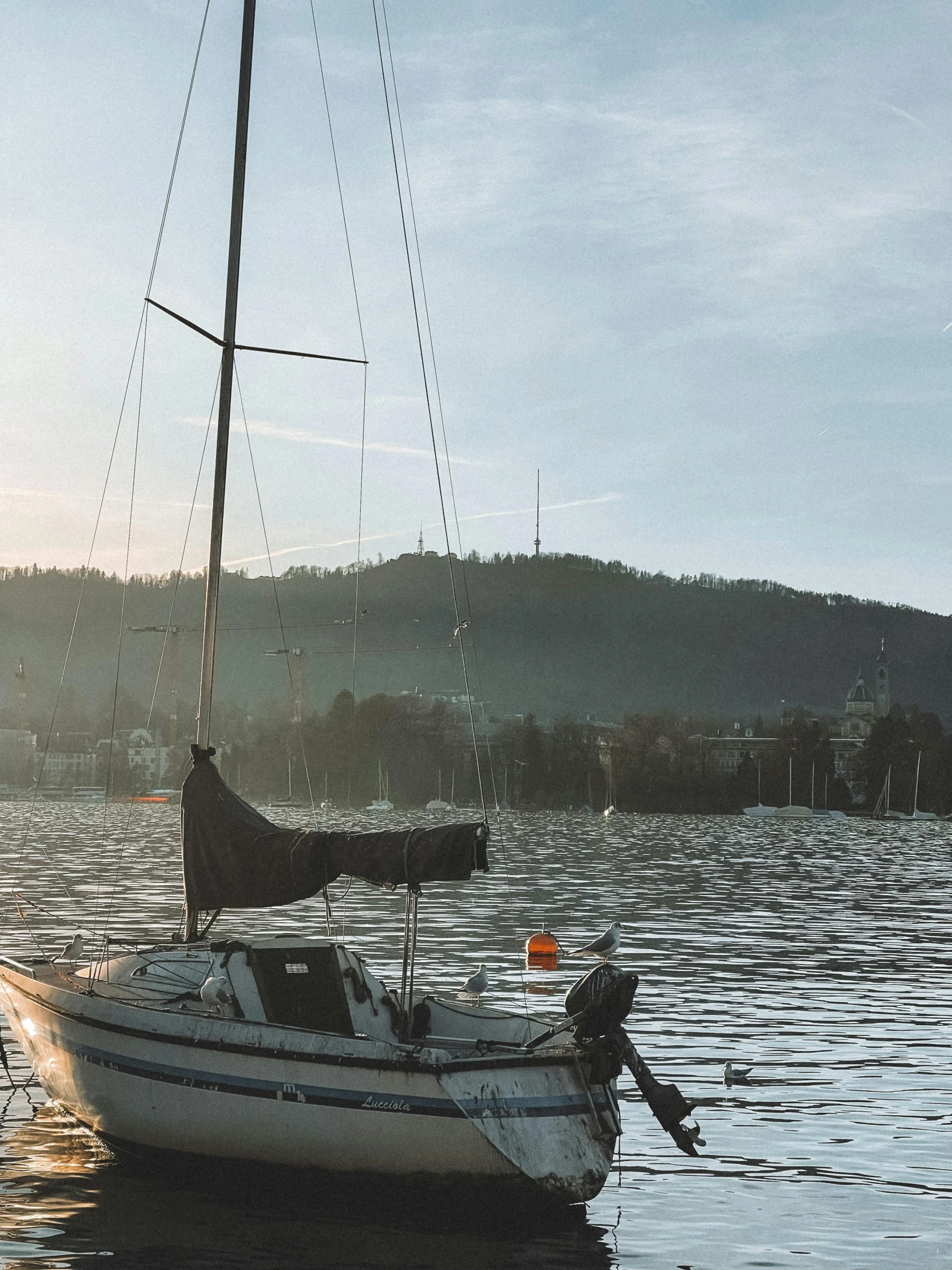 a boat in the middle of water at a lake