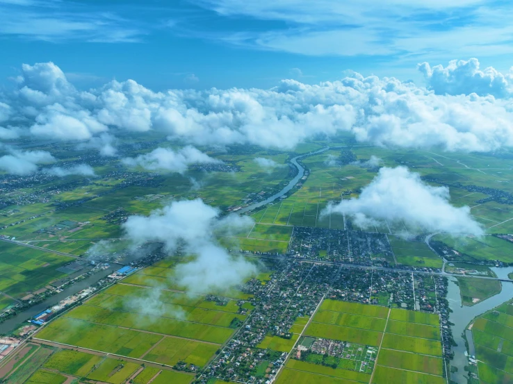 some very big clouds floating in the sky