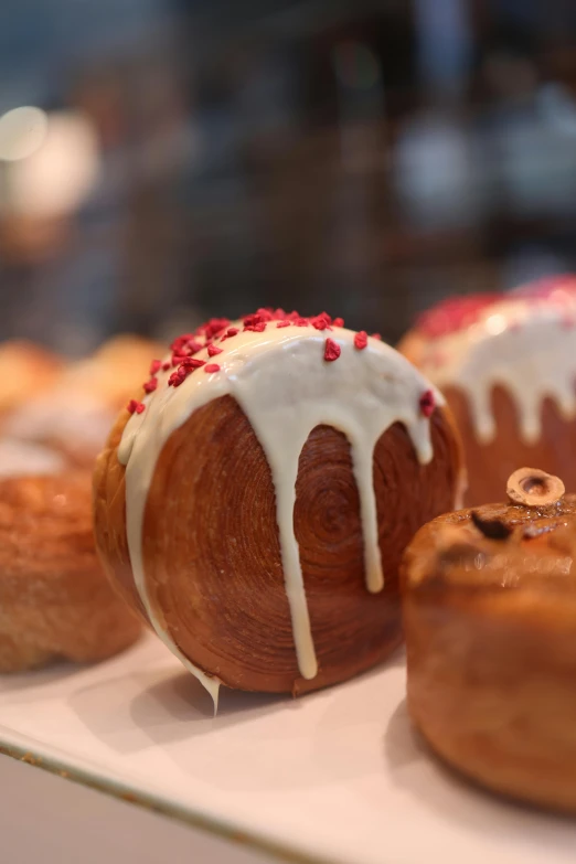 baked goods sit in a row on a counter