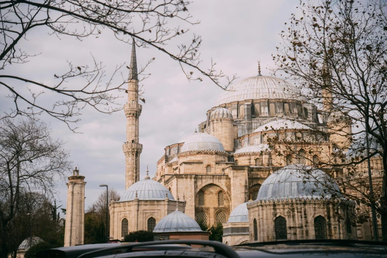 a very large and old building with blue domes