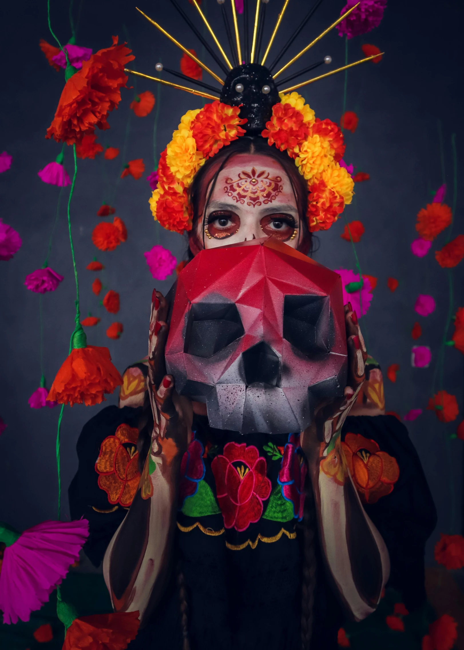 a woman with a large, colorful skull on her face