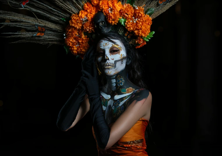 a beautiful woman in makeup and flowers in her hair