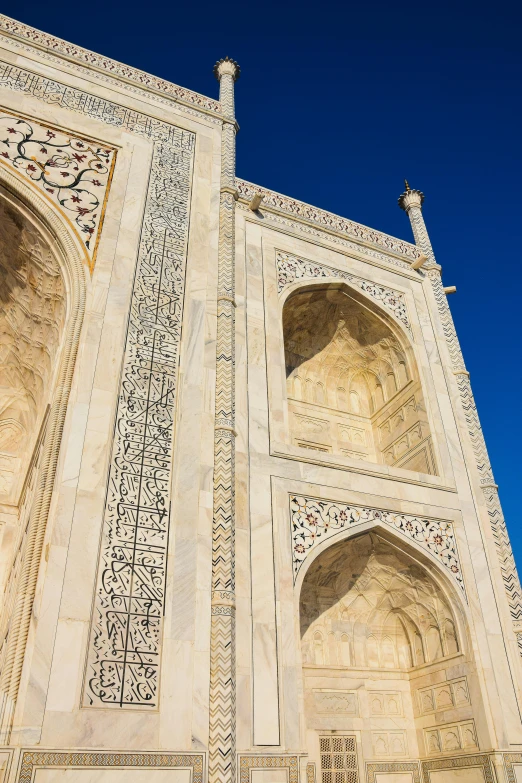 the intricate architectural design on the side of a building