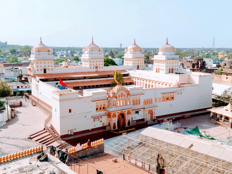 a large white building on top of a roof