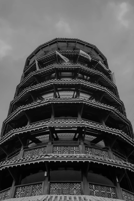 a very tall tower with ornate wrought iron work