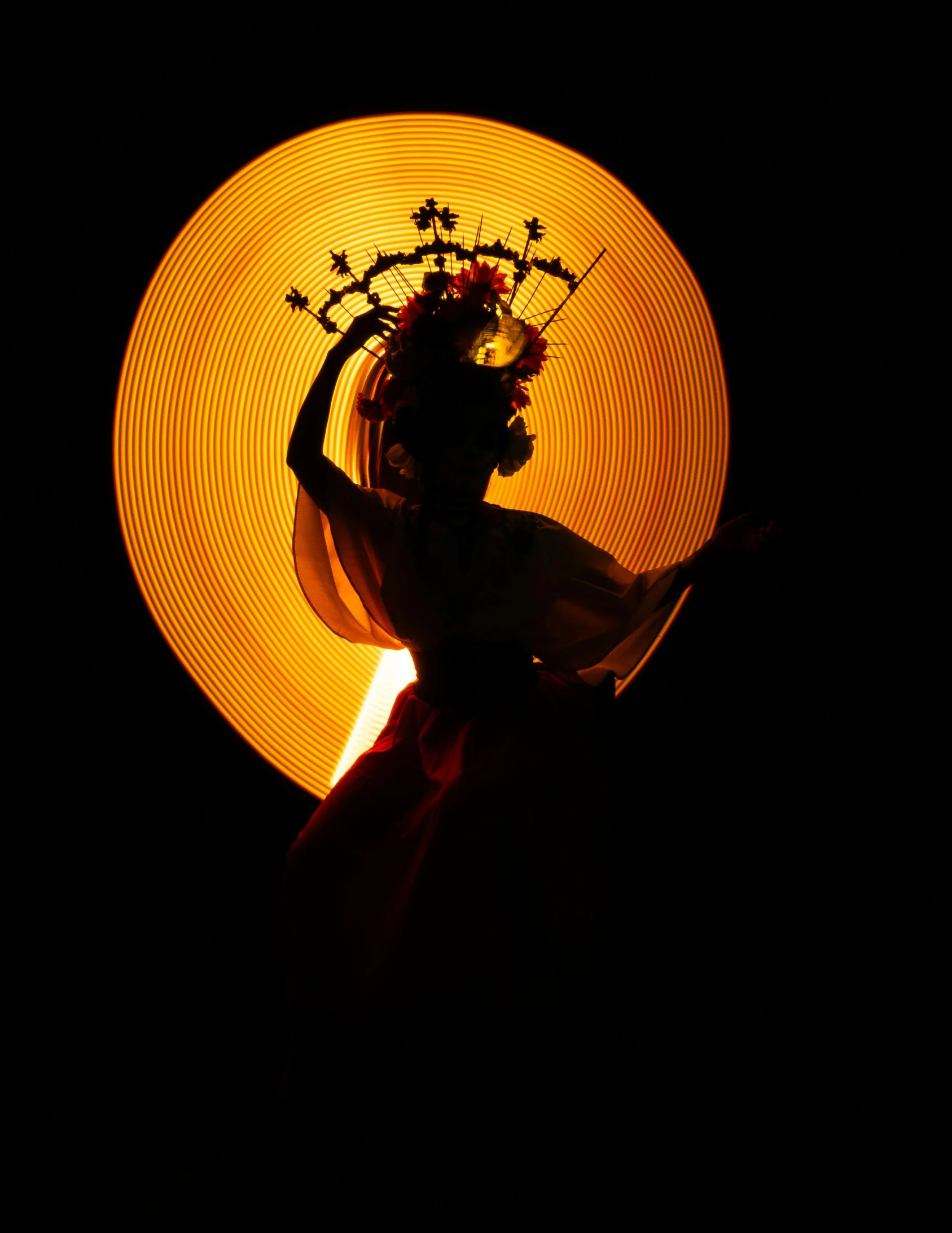 a silhouette of a woman wearing a hat with the word dead on it