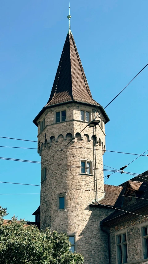an old building has a steeple on the front